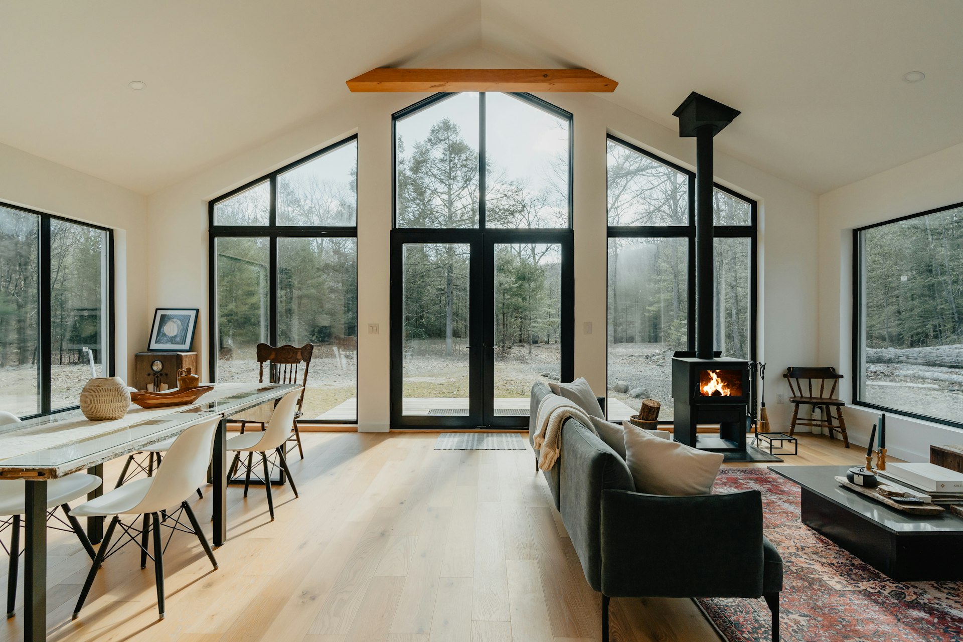 a living room filled with furniture and a fire place